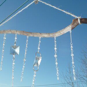 Suncatcher N Treated driftwood, cut glass pieces and Swarovski crystals